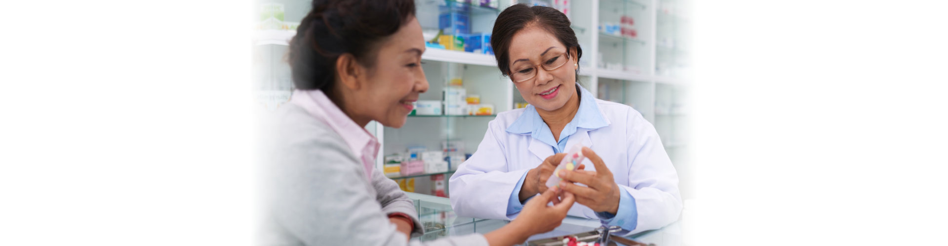 woman talking to a pharmacist